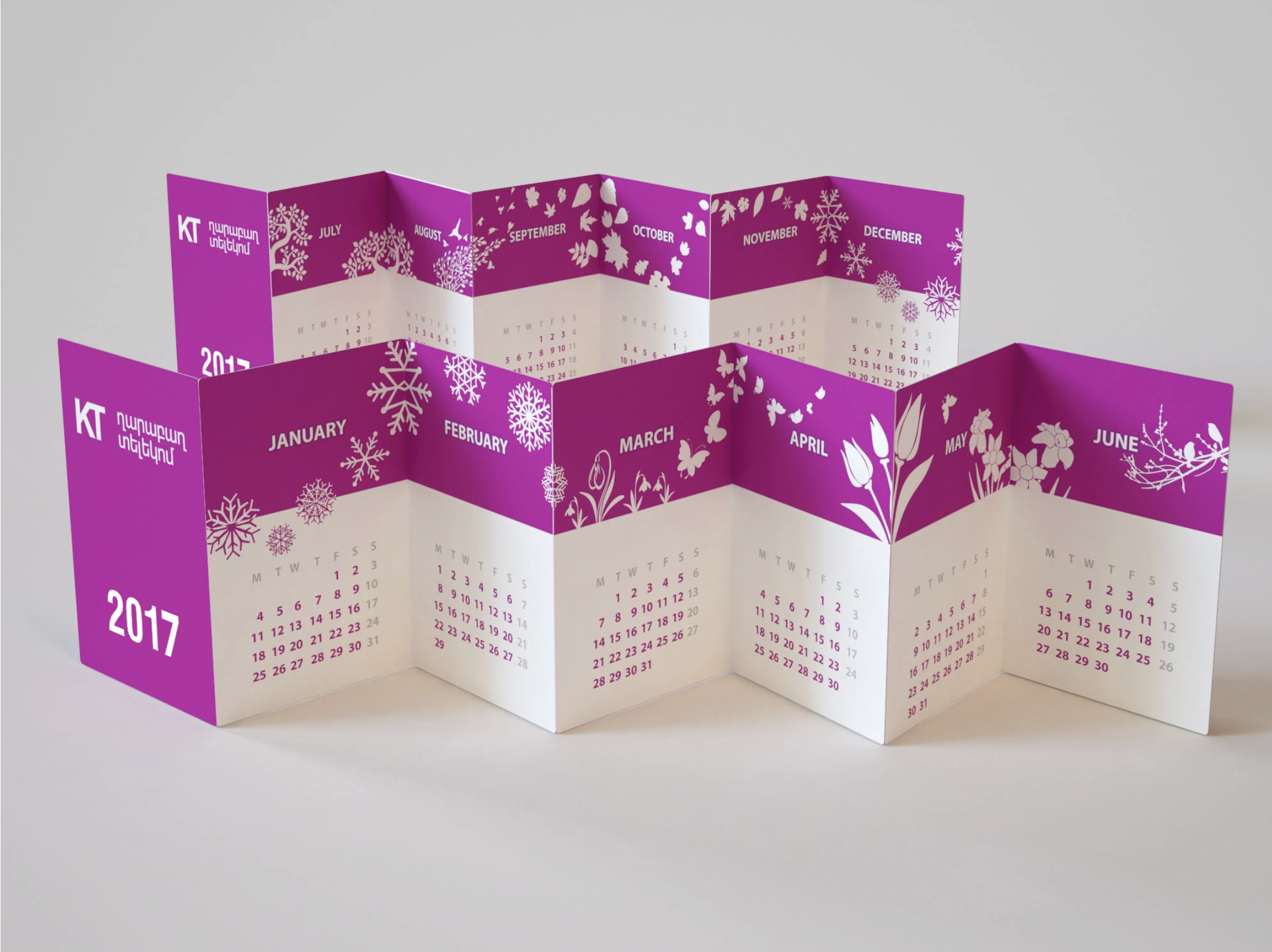 KT accordion-fold desk calendar.