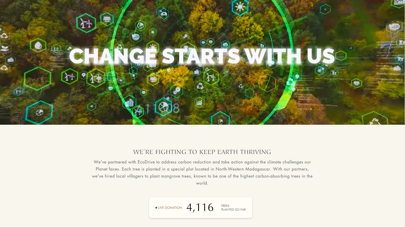 Change Starts With Us — EcoDrive partnership banner with a forest-and-data video hero and a live tree-planted counter ticking upward.